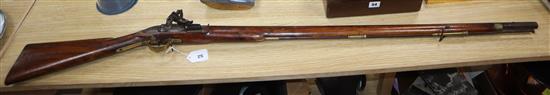 A 19th century Brown Bess-type flintlock musket, Jaipur Armoury, stamped JPR/EXR/ 336 length 142cm, restoration to stock